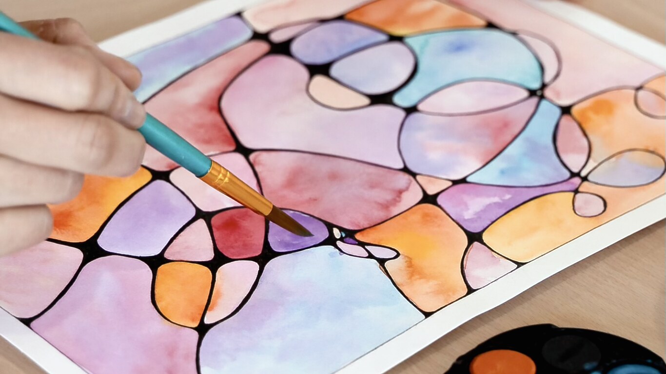 Close up of watercolour paint being applied to a piece of art